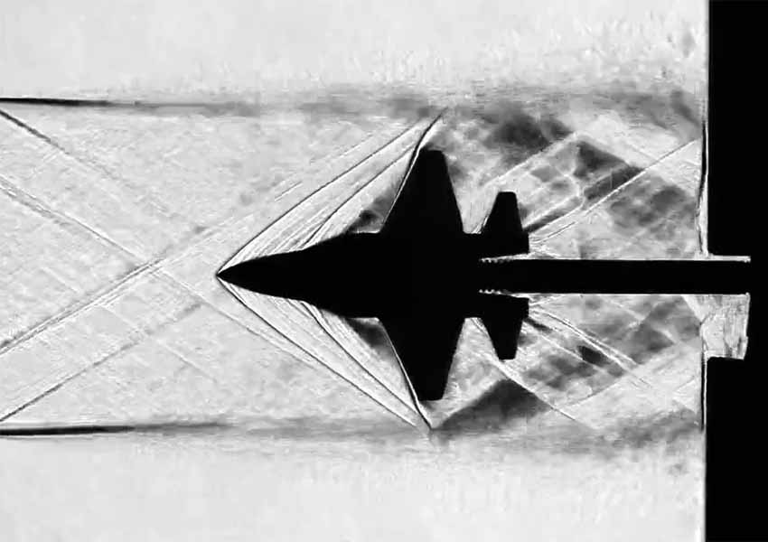 Shock/expansion waves in Mach 2 flow around a model (schlieren photo)